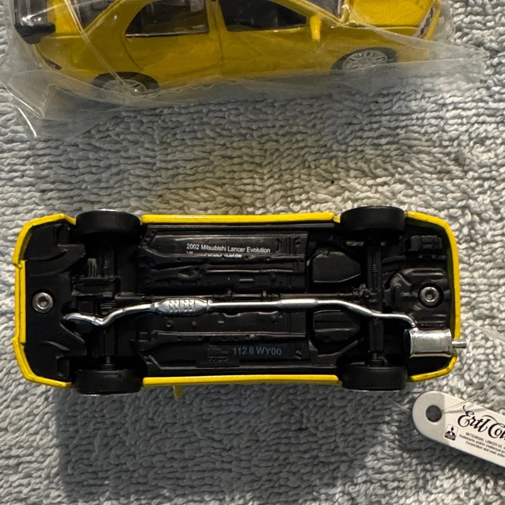 NWT ERTL Collectibles 2002 Mitsubishi Lancer Evolution Die Cast Model set of 2